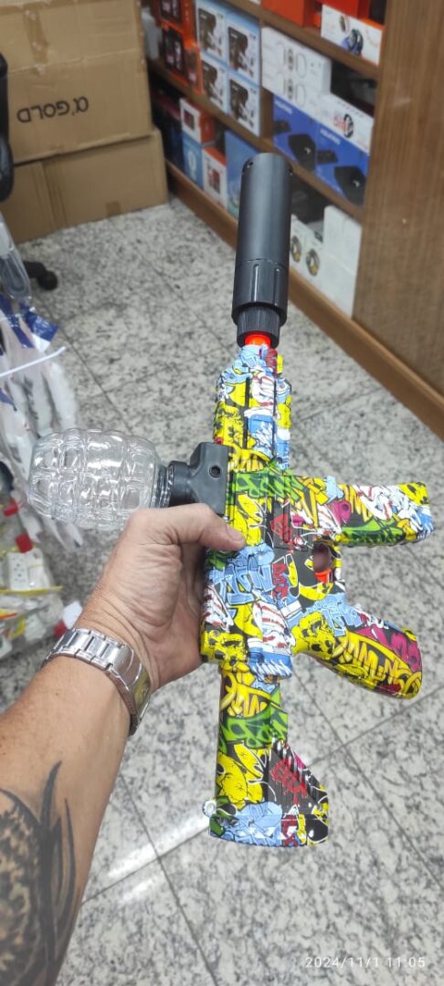 Vendo metralhadora de brinquedo